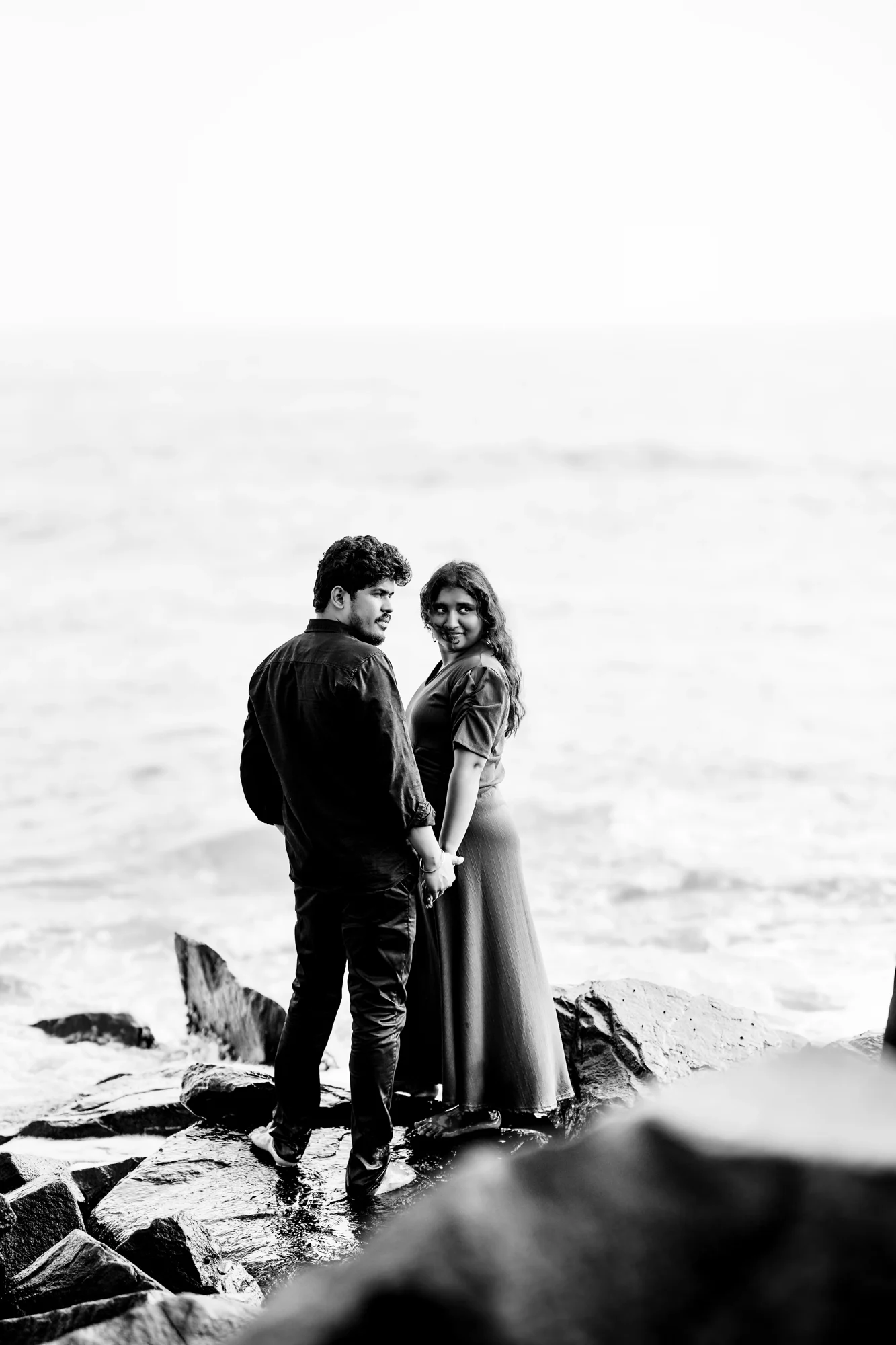 Hand in hand beside the sea